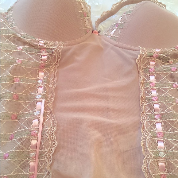 Beautiful vintage bustier . Gorgeous lace and color .like new never worn